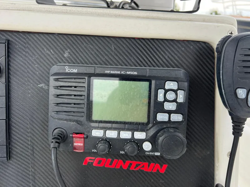 Slide: The Image of VHF marine radio on 1998 Fountain 31 CC boat dashboard. - 9