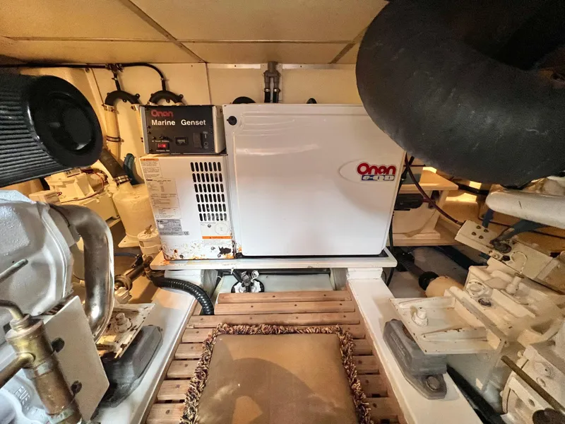 Slide: The Image of Engine room of 2007 Grand Banks 39 Eastbay SX with Onan marine generator. - 29