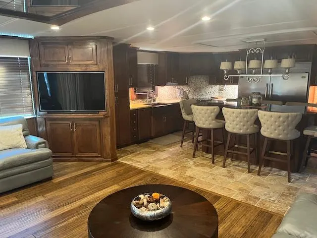 Slide: The Image of Luxurious 2010 Stardust Cruisers houseboat interior with modern kitchen and cozy living area. - 13