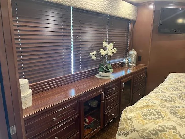 Slide: The Image of Luxurious 2010 Stardust Cruisers houseboat interior with elegant wood cabinetry and decor. - 25
