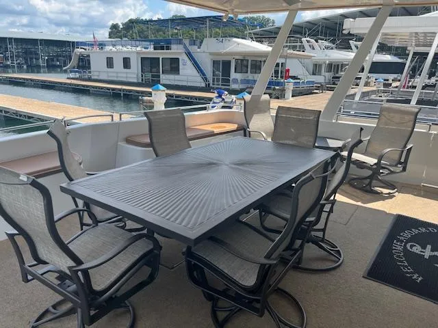 Slide: The Image of Spacious deck on 2010 Stardust Cruisers houseboat with outdoor dining area. - 7