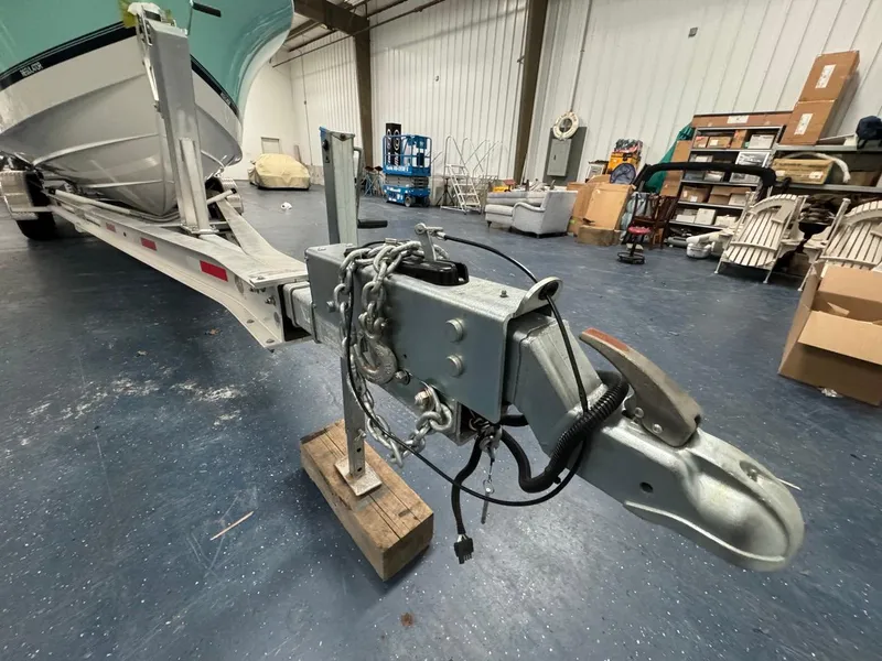 Slide: The Image of 2022 Regulator 25 boat on trailer in storage facility. - 42