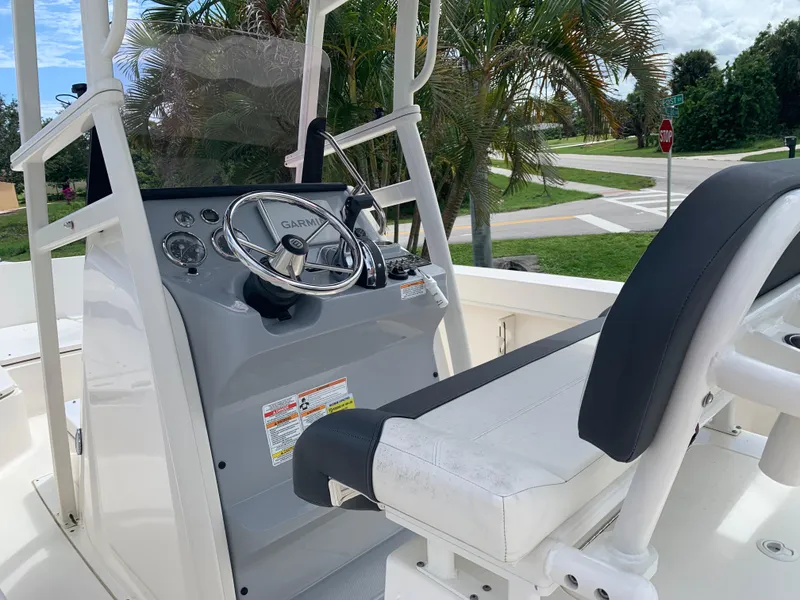Slide: The Image of Trophy T22 boat console with steering wheel and seating, 2021 model. - 3