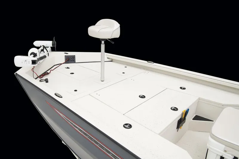 Slide: The Image of 2024 Ranger RB200 boat console with steering wheel, gauges, and navigation system. - 11