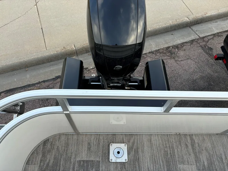 Slide: The Image of 2024 Ranger Reata 223FC boat with outboard motor, viewed from above. - 11