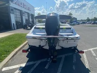 Slide: The Image of 2024 Tahoe T16 boat at service center, rear view. - 14