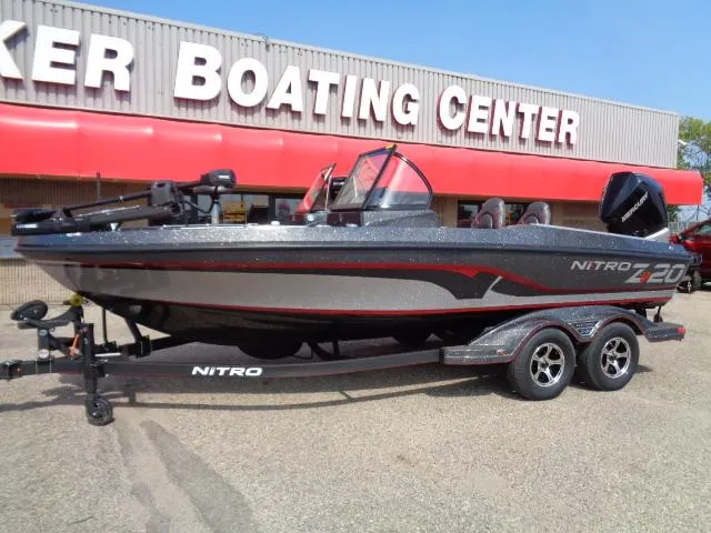 Slide: The Image of 2024 Nitro ZV20 Pro fishing boat at dealership, side view. - 1
