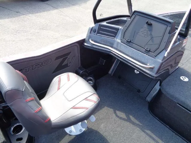 Slide: The Image of 2024 Nitro ZV20 Pro boat interior with seat and dashboard. - 11