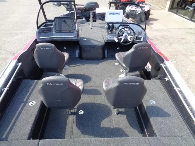 Slide: The Image of 2024 Nitro ZV20 Pro boat interior with four seats and modern dashboard. - 6