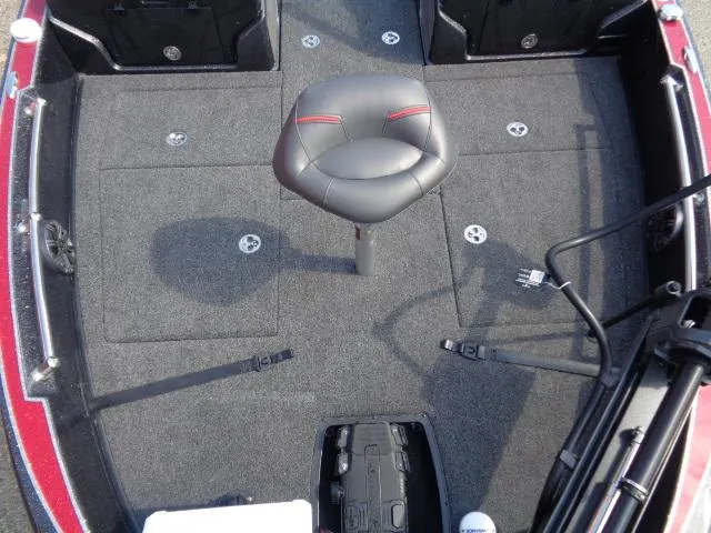 Slide: The Image of 2024 Nitro ZV20 Pro boat interior with gray carpet and central seat. - 9