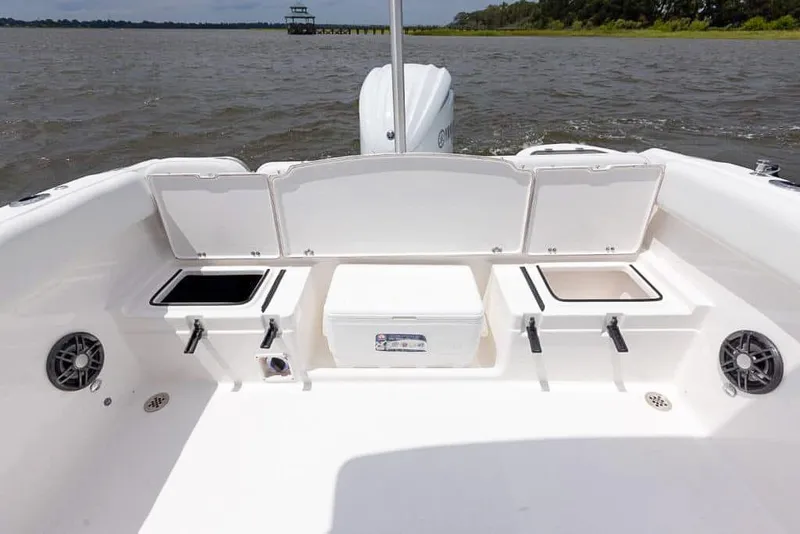 Slide: The Image of 2025 Sea Fox 228 Traveler boat interior with storage compartments and speakers. - 13