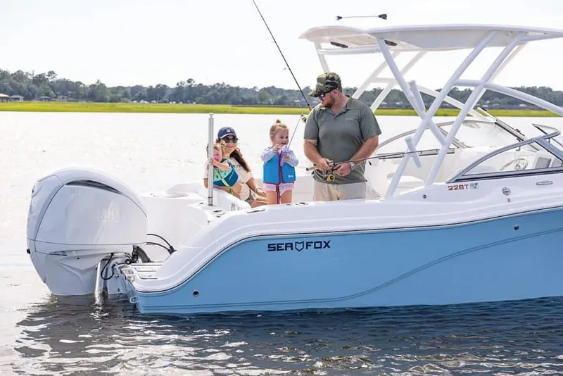 Slide: The Image of Family enjoying fishing on 2025 Sea Fox 228 Traveler boat. - 6