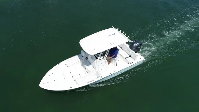 Slide: The Image of Aerial view of 2025 Sea Fox 231 Bay Fox boat cruising on water. - 10