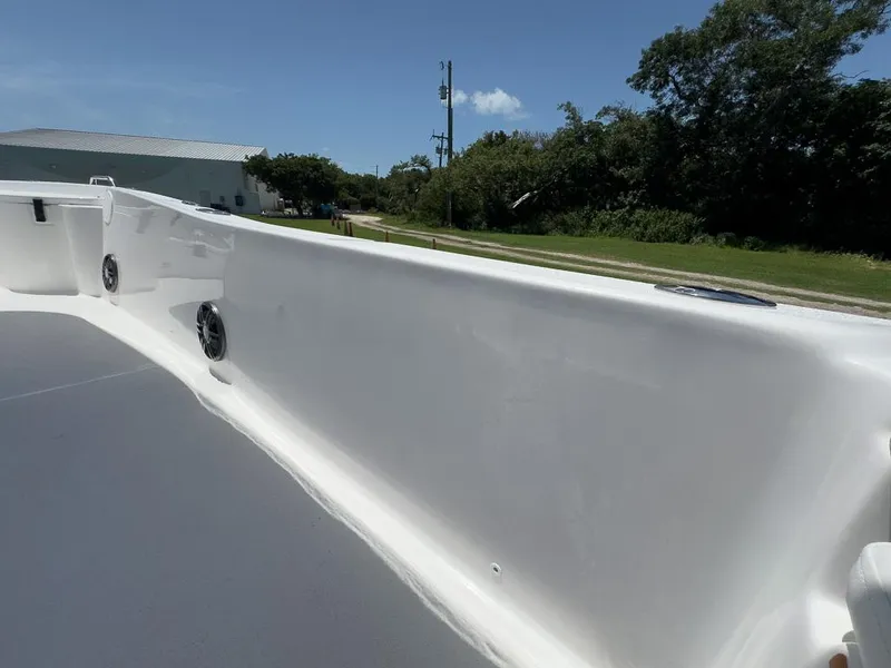 Slide: The Image of 2025 Sea Fox 231 Bay Fox boat interior, featuring sleek white design and spacious deck. - 24
