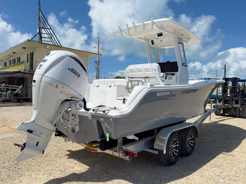 Slide: The Image of 2025 Sea Fox 248 Commander boat on trailer with Yamaha outboard motor. - 4