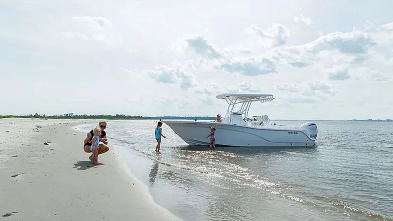 Slide: The Image of Family enjoying beach near 2025 Sea Fox 248 Side Console boat. - 10