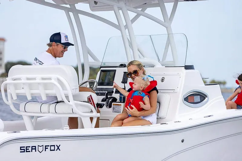 Slide: The Image of Family enjoying a ride on a 2025 Sea Fox 248 Side Console boat. - 3