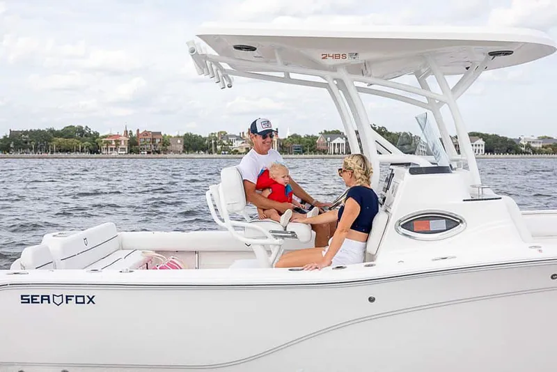 Slide: The Image of Family enjoying a ride on a 2025 Sea Fox 248 Side Console boat. - 5