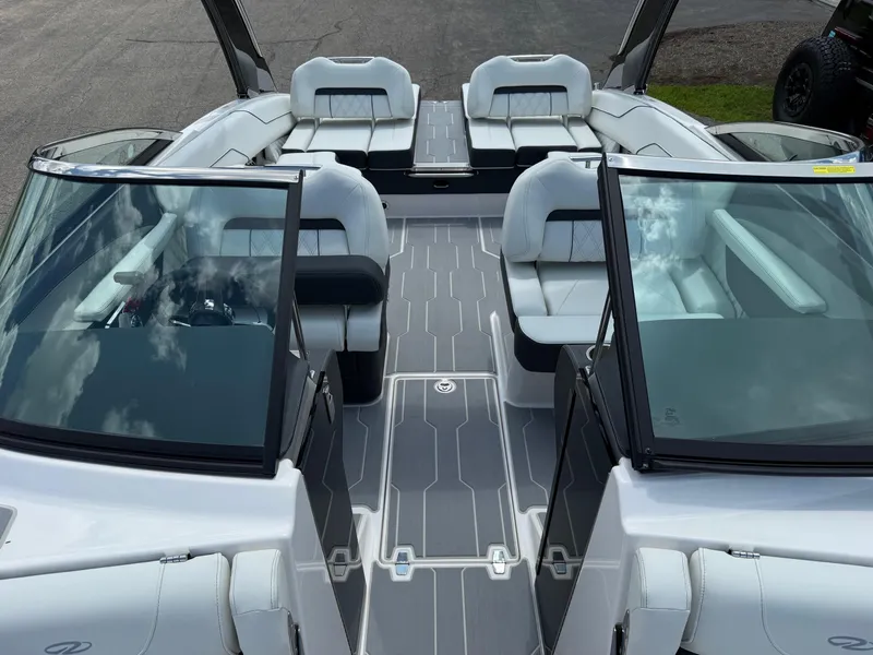 Slide: The Image of 2025 Regal LS4 boat interior with sleek seating and modern design. - 4