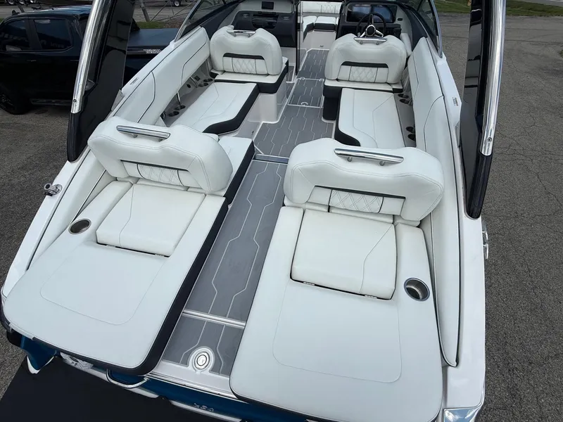 Slide: The Image of 2025 Regal LS4 boat interior with luxurious white seating and modern design. - 5