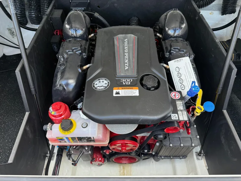 Slide: The Image of 2025 Regal LS4 engine compartment featuring a Volvo Penta 300 V8 engine. - 6
