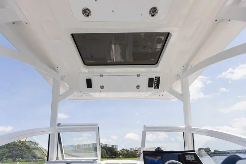 Slide: The Image of Interior view of 2025 Sea Fox 268 Traveler boat, showcasing the roof and dashboard. - 17