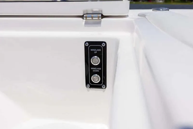 Slide: The Image of 2025 Sea Fox 268 Traveler windlass control panel with up and down buttons. - 22
