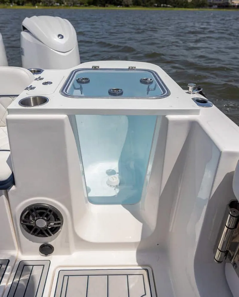 Slide: The Image of 2025 Sea Fox 268 Traveler boat with sleek design and modern amenities on the water. - 23