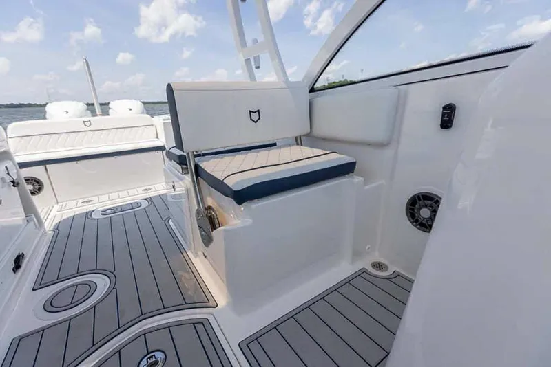 Slide: The Image of 2025 Sea Fox 268 Traveler boat interior with cushioned seating and sleek design. - 25