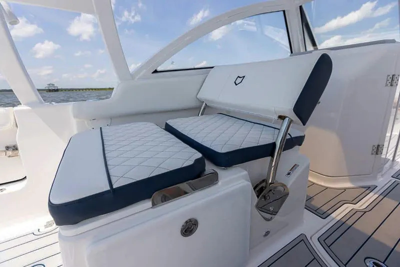Slide: The Image of 2025 Sea Fox 268 Traveler boat interior with cushioned seating and modern design. - 27