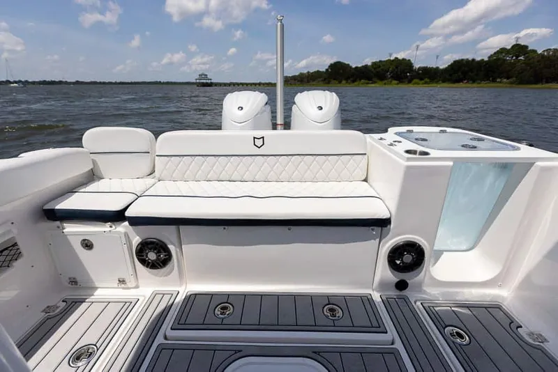 Slide: The Image of 2025 Sea Fox 268 Traveler boat interior with seating and water view. - 34