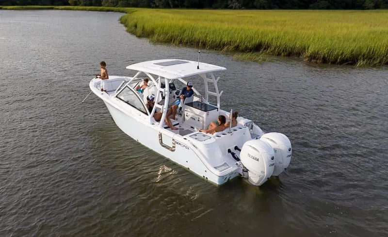 Slide: The Image of 2025 Sea Fox 268 Traveler boat cruising on a serene river with passengers. - 5