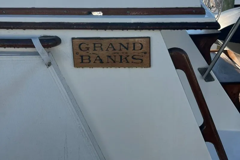 Slide: The Image of 1978 Grand Banks 38 boat with wooden nameplate. - 10