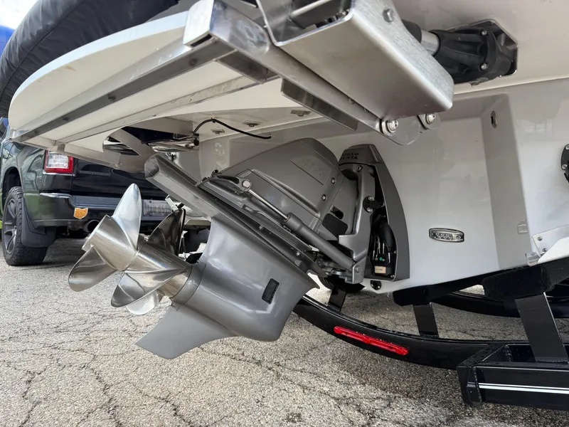 Slide: The Image of 2025 Regal LS6 boat with dual propeller system, parked on a trailer. - 10