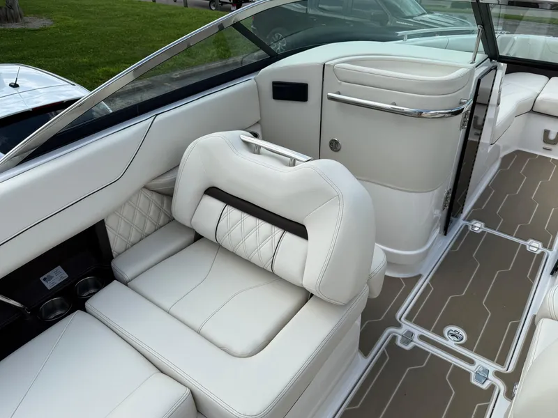 Slide: The Image of Luxurious interior of 2025 Regal LS6 boat with white leather seating and modern design. - 12
