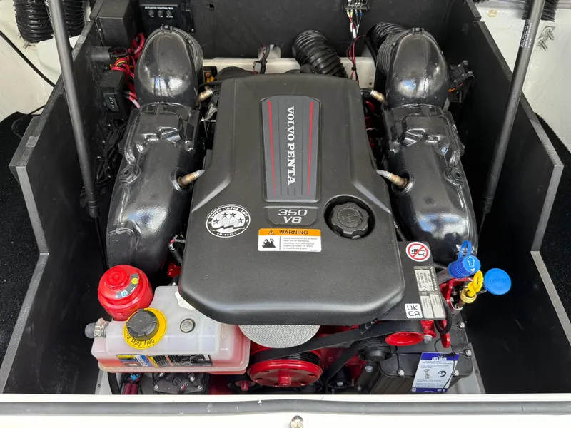 Slide: The Image of 2025 Regal LS6 engine compartment featuring a Volvo Penta 350 V8 engine. - 5