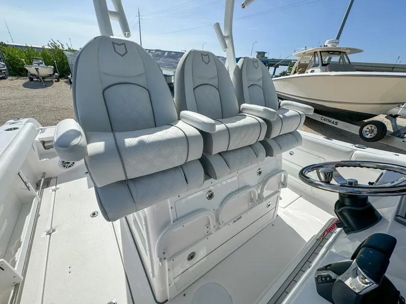 Slide: The Image of 2025 Sea Fox 328 Commander boat with luxurious seating and modern helm design. - 17