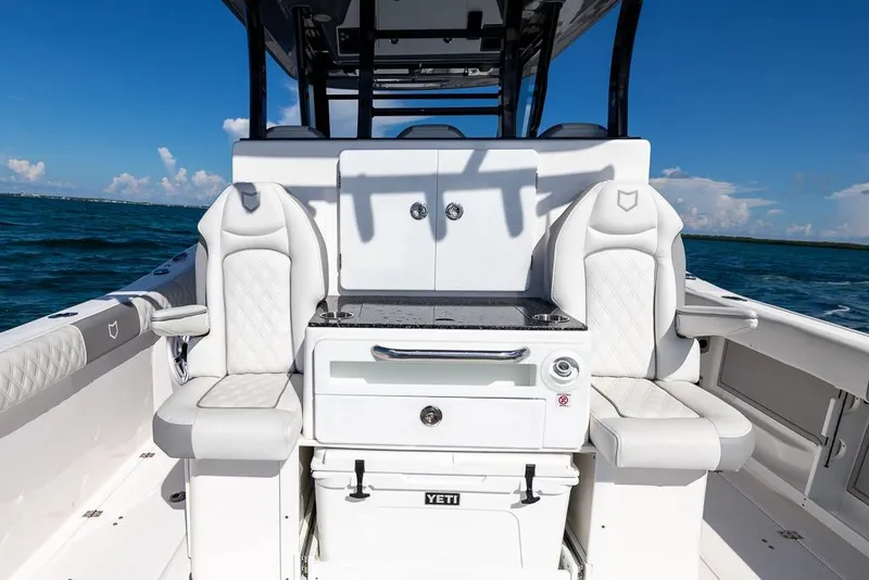 Slide: The Image of 2025 Sea Fox 368 Commander boat interior with luxury seating and ocean view. - 21