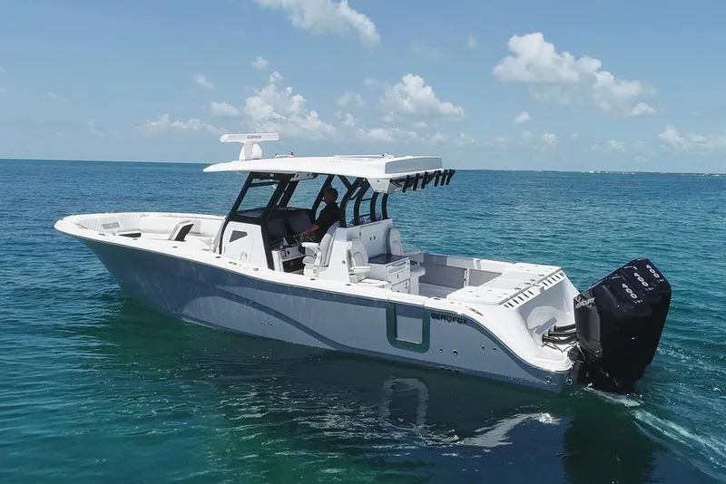 Slide: The Image of 2025 Sea Fox 368 Commander boat on clear blue ocean water. - 5