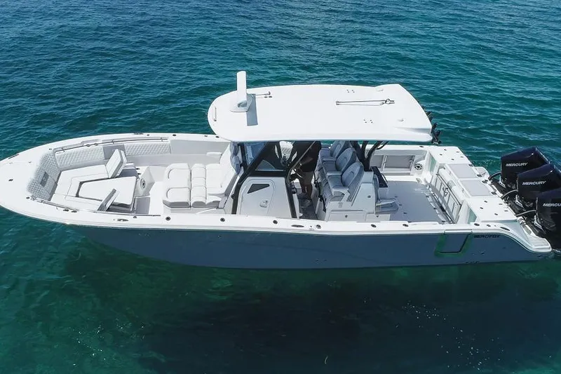 Slide: The Image of 2025 Sea Fox 368 Commander boat on clear blue water, aerial view. - 7