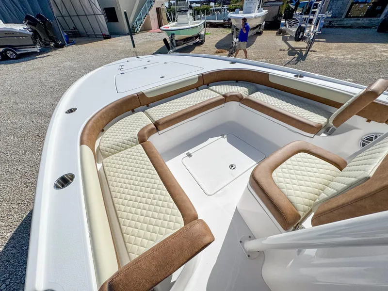 Slide: The Image of 2024 Caymas 26 HB boat with spacious seating and elegant design. - 19