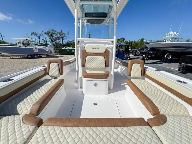 Slide: The Image of 2024 Caymas 26 HB boat interior with luxurious seating and modern design. - 22