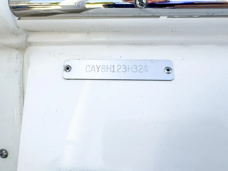 Slide: The Image of 2024 Caymas 28 HB boat identification plate with serial number. - 35