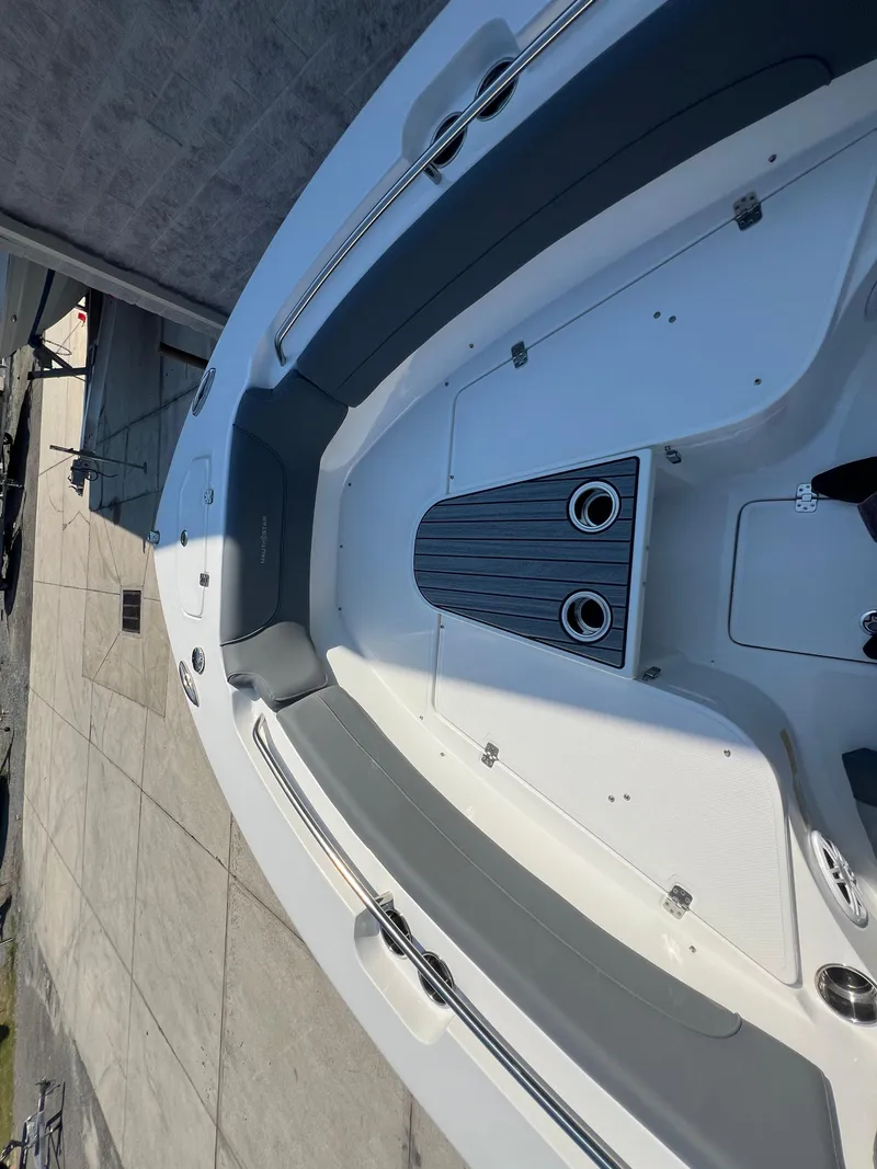 Slide: The Image of 2025 NauticStar 252L boat deck with sleek design and modern features. - 27
