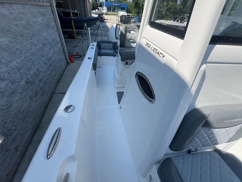 Slide: The Image of 2025 NauticStar 252L boat interior, featuring sleek seating and modern design elements. - 32