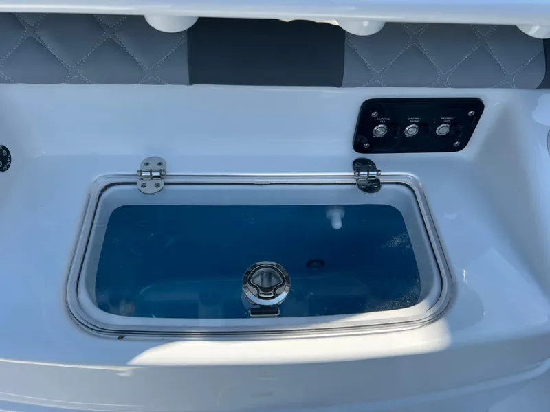Slide: The Image of 2025 NauticStar 252L boat livewell with control panel. - 41
