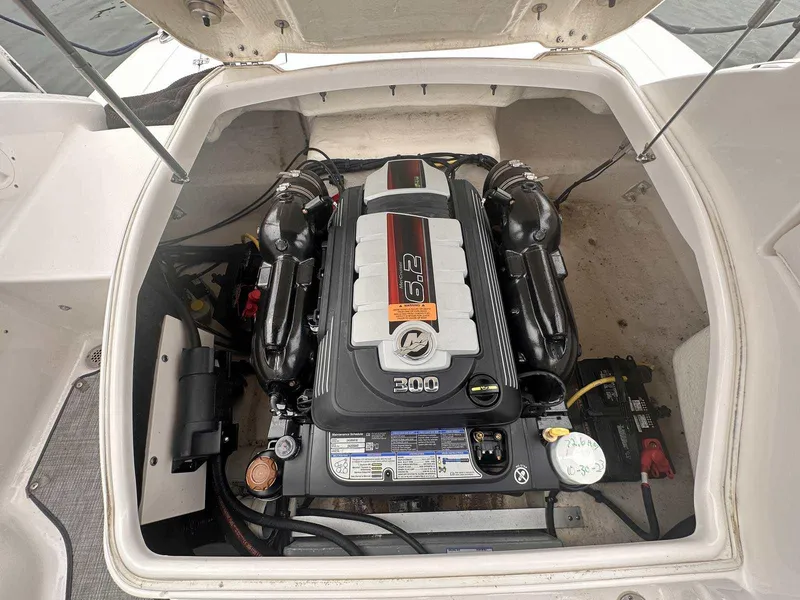 Slide: The Image of 2019 Chaparral 244 Sunesta engine compartment with MerCruiser 200 engine. - 11