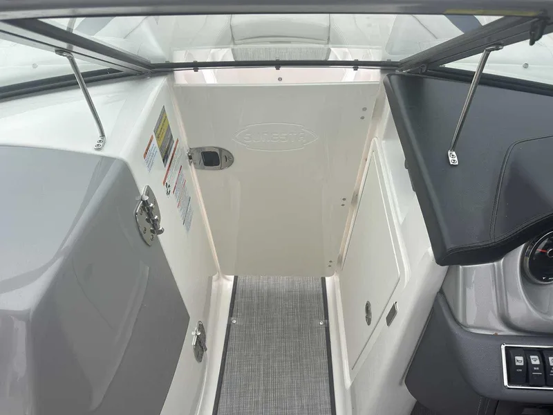 Slide: The Image of 2019 Chaparral 244 Sunesta boat interior with cockpit view. - 23