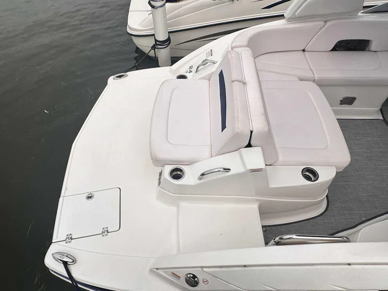 Slide: The Image of 2019 Chaparral 244 Sunesta boat with white seating and swim platform. - 3