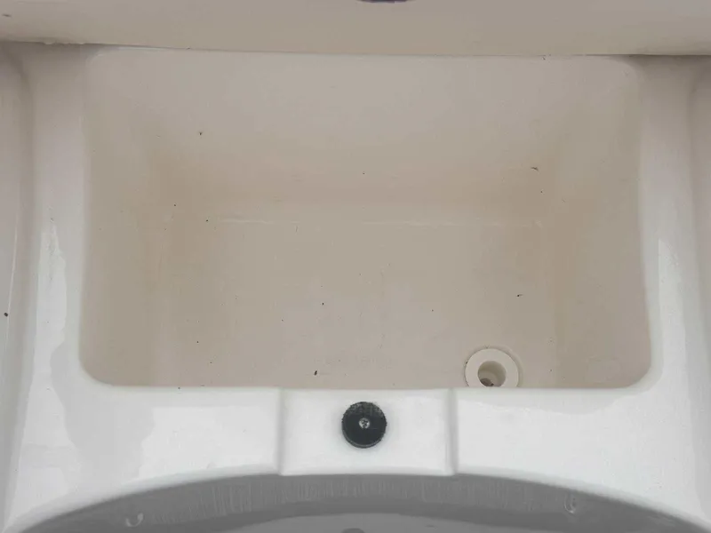 Slide: The Image of Empty storage compartment in 2019 Chaparral 244 Sunesta boat. - 34